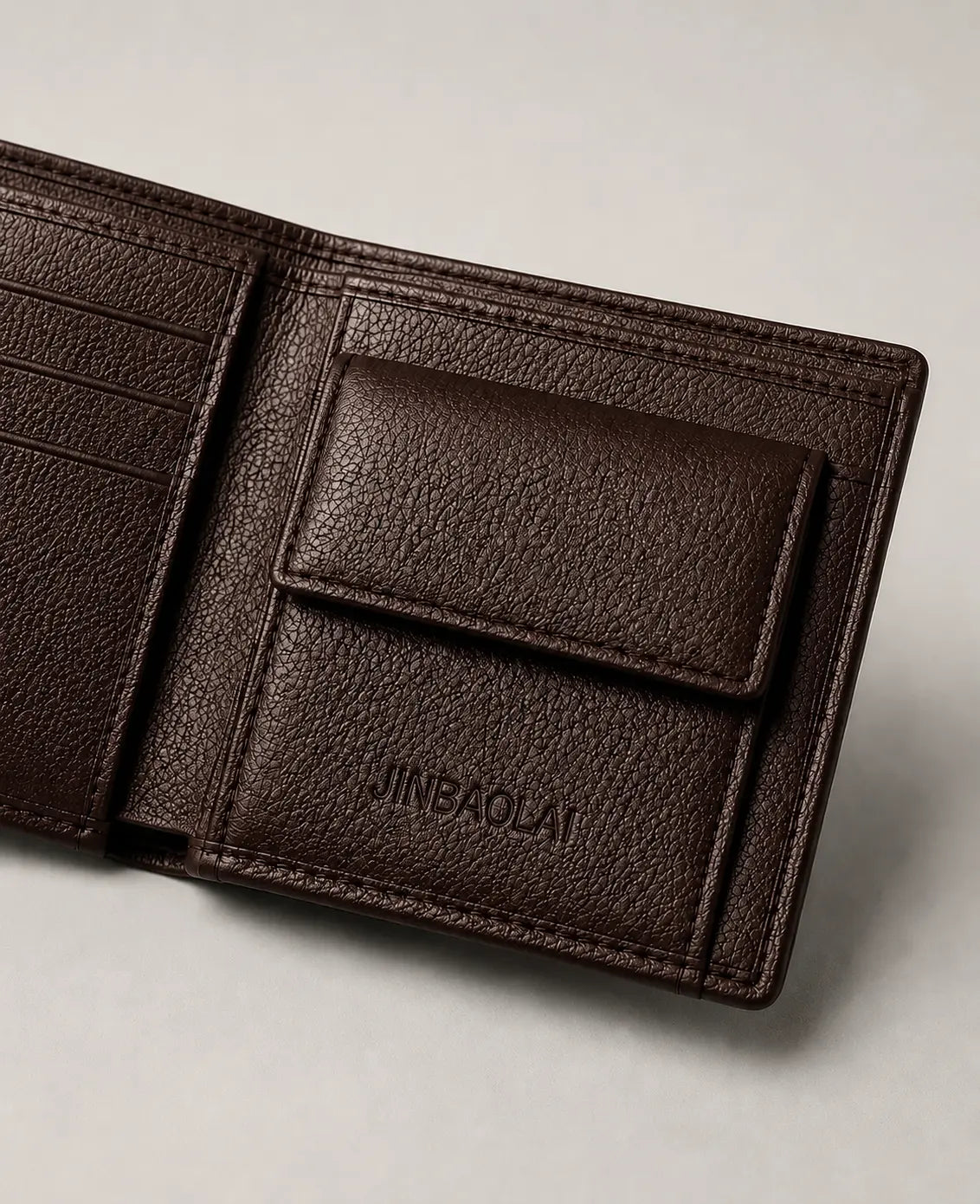 Zoom sur le porte-monnaie du portefeuille pour homme jinbaolai marron